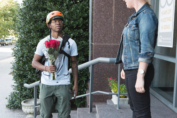 Bike messenger delivers flowers in Washington, DC.