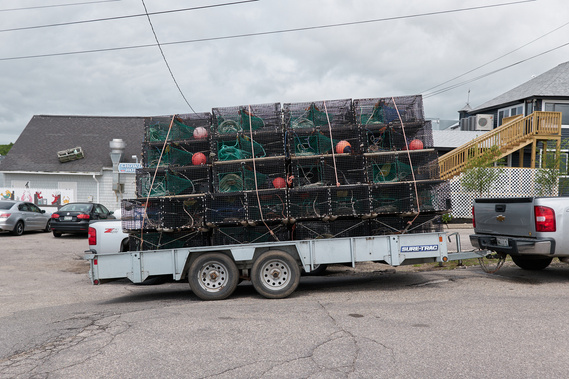Lobster traps stacked on a trailer in Kennebunkport, Maine
