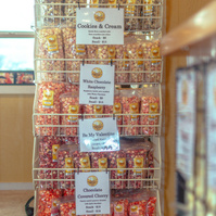 A metal rack holds popcorn.