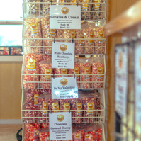 A metal rack holds popcorn.