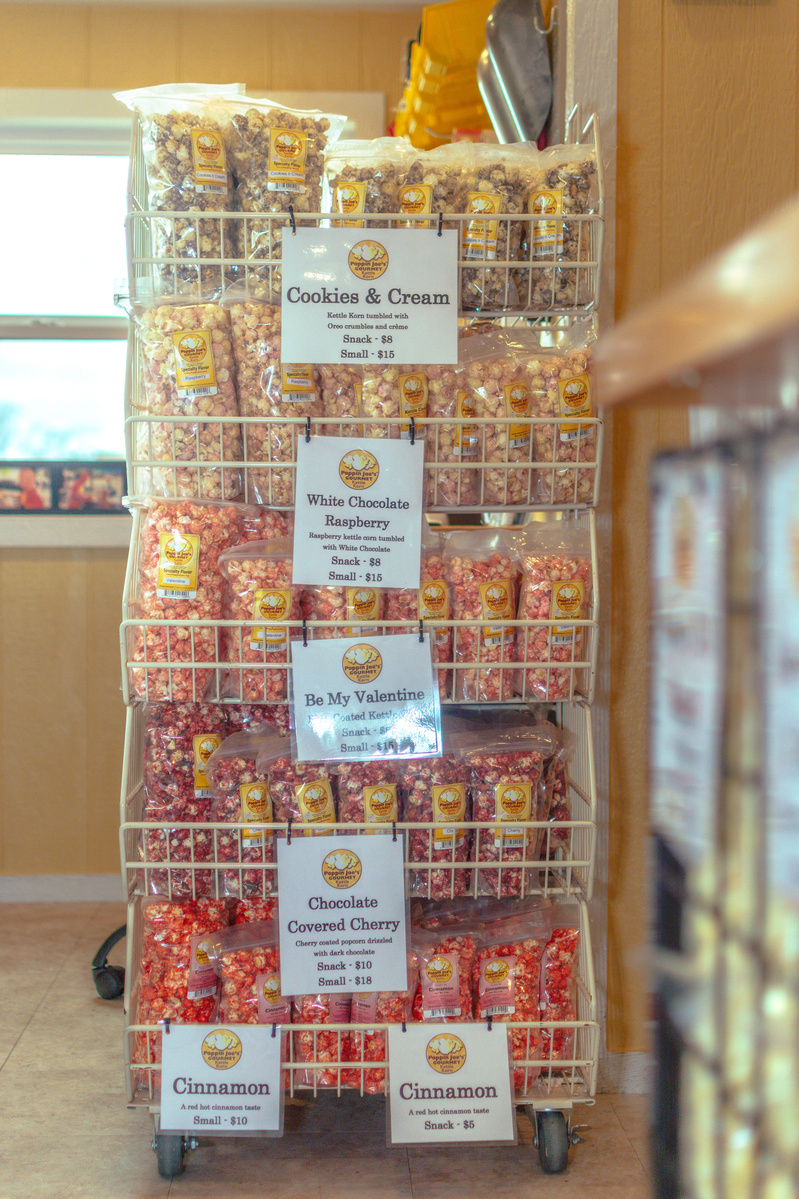 A metal rack holds popcorn.