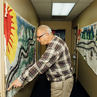 A Dream Weaver member talks about hanging art. 
