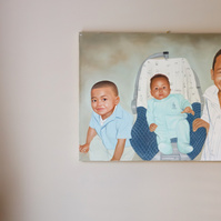 A painting of two young children and a baby. 