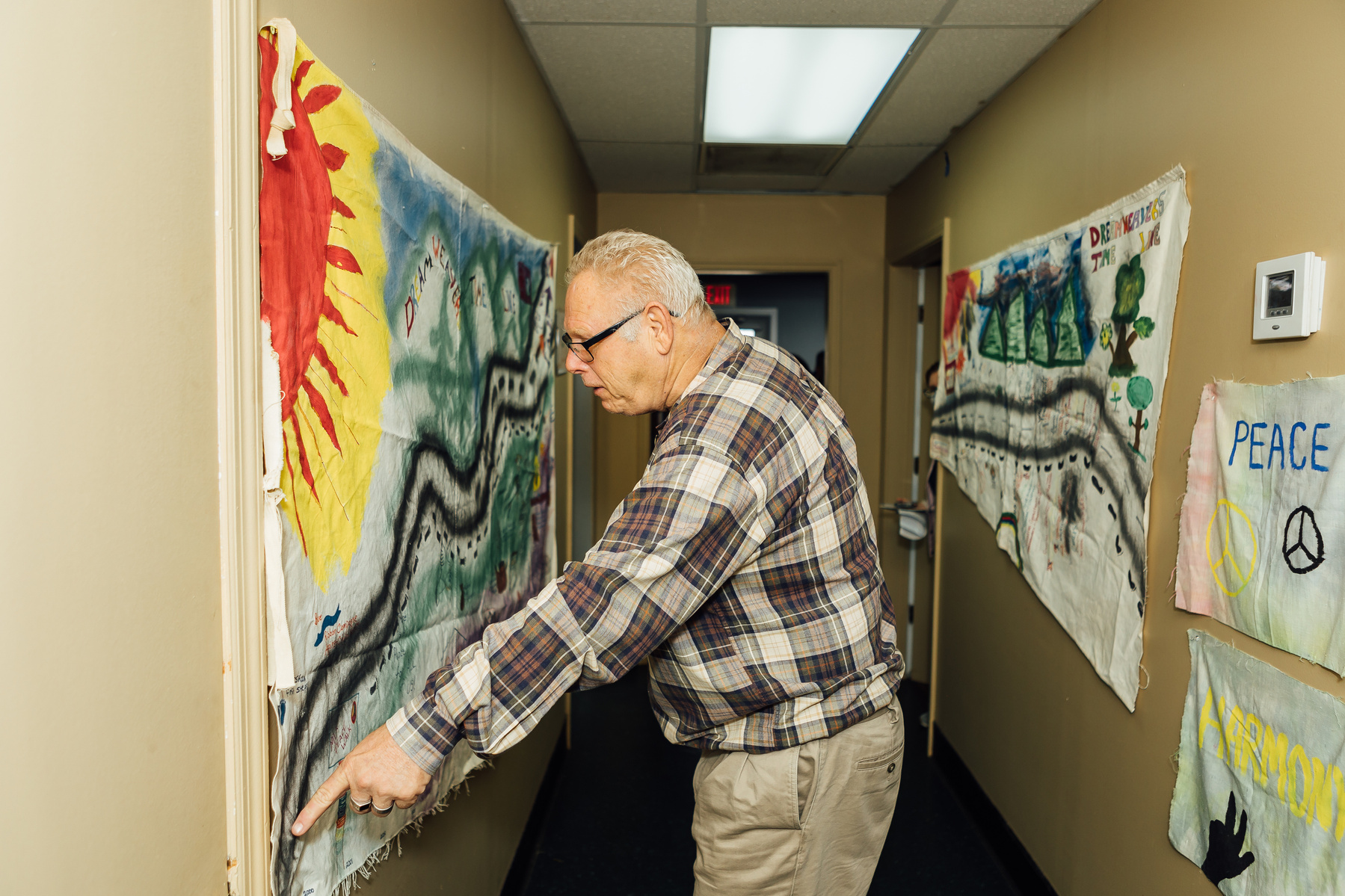 A Dream Weaver member talks about hanging art. 