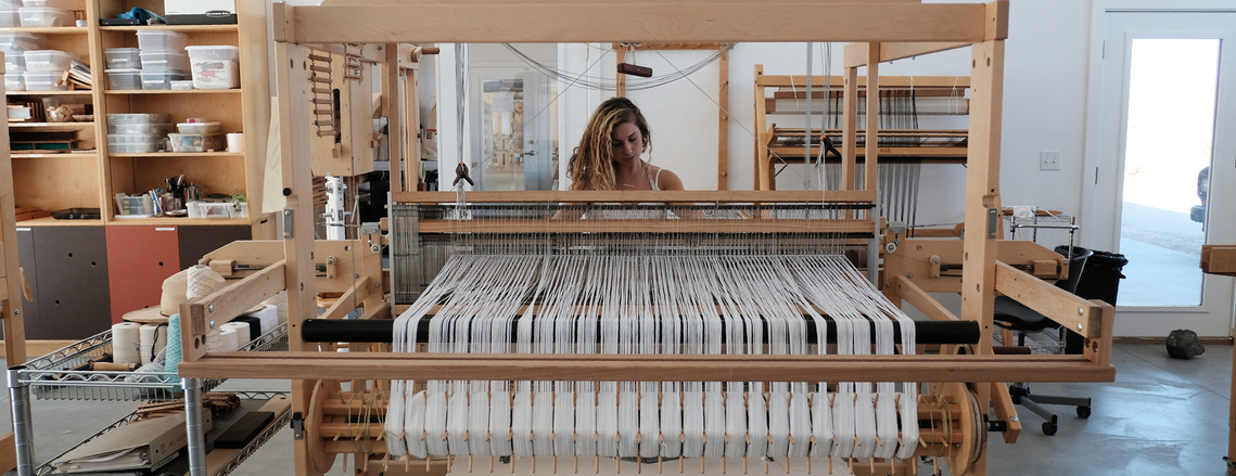 Francesca Capone weaving at the AZ West Residency in Joshua Tree California.