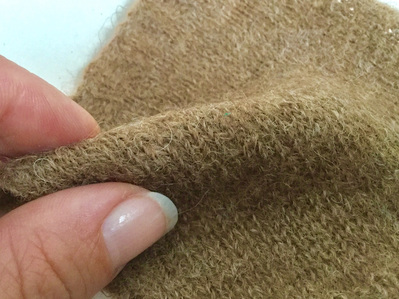 A piece of handknitted fabric made from handspun Manx Loaghtan sheep wool.