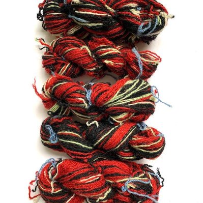 Five skeins of unraveled yarn ready to be repurposed.