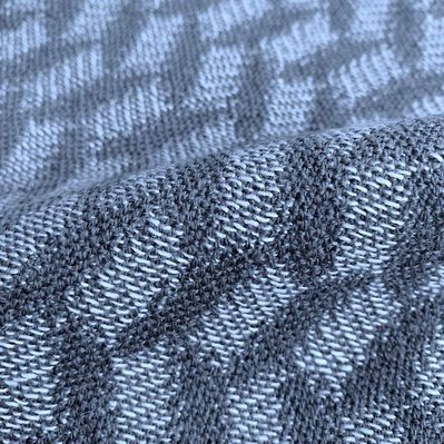 handwoven fabric with a playfull pattern of wiggling rectangles by Joost Post 