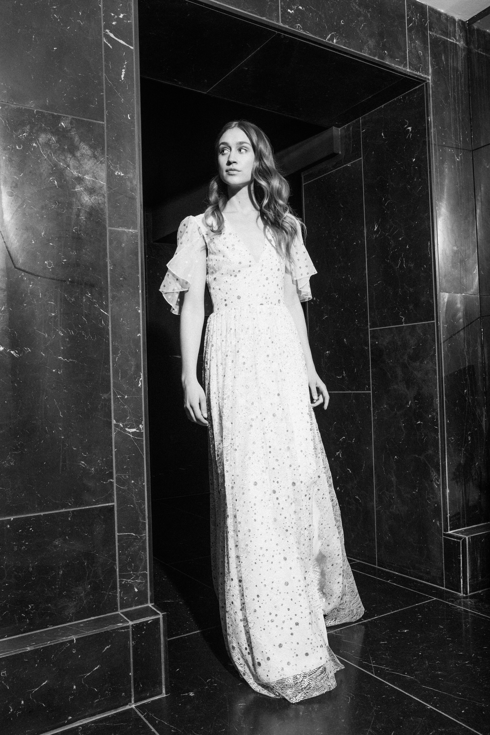 Maria Fekih´s 2018 bridal collection is inspired by past decades to add a couture elegance from the 40s and the playfulness of the 70s to the collection using fine French laces with bees and gold dots. Shot at Hotel Nobis CPH