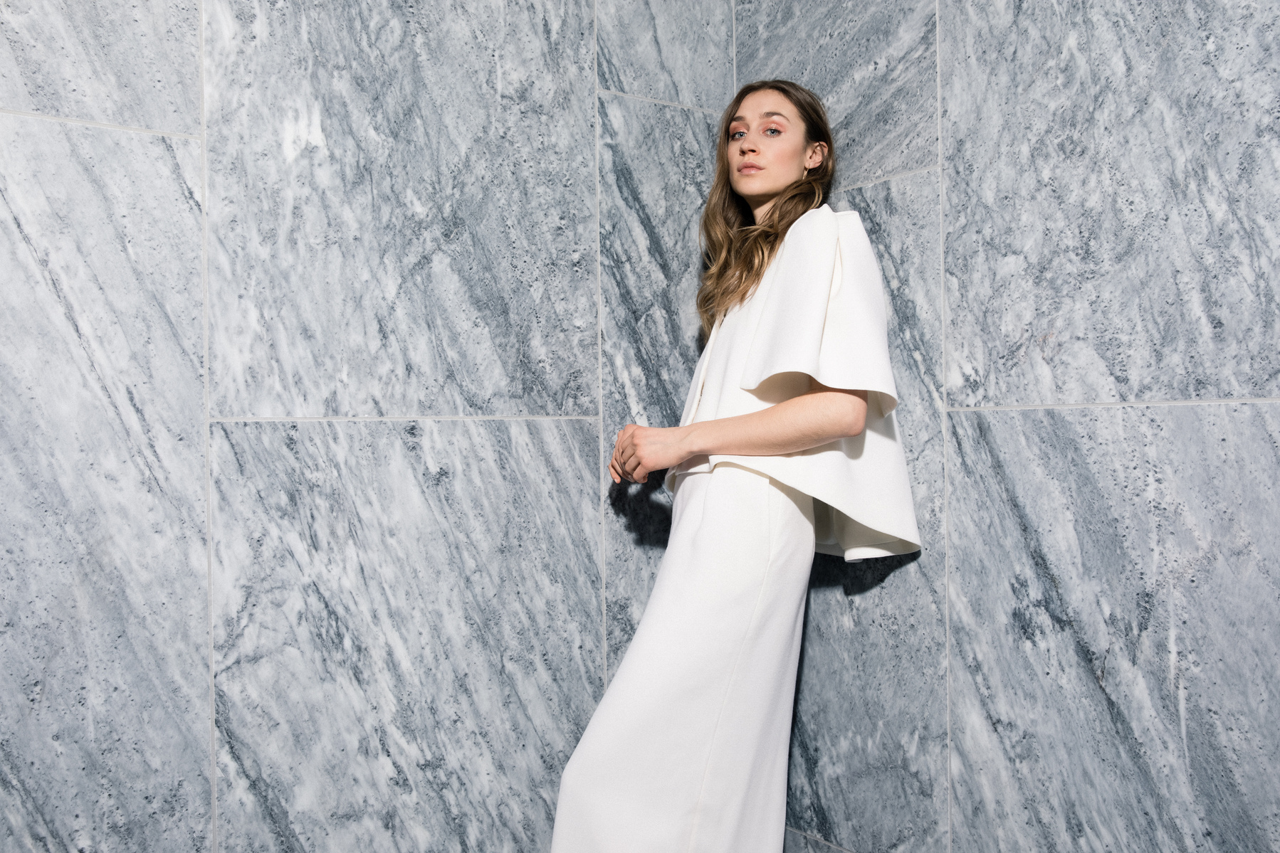 Maria Fekih´s 2018 bridal collection is inspired by past decades to add a couture elegance from the 40s and the playfulness of the 70s to the collection using fine French laces with bees and gold dots. Shot at Hotel Nobis CPH