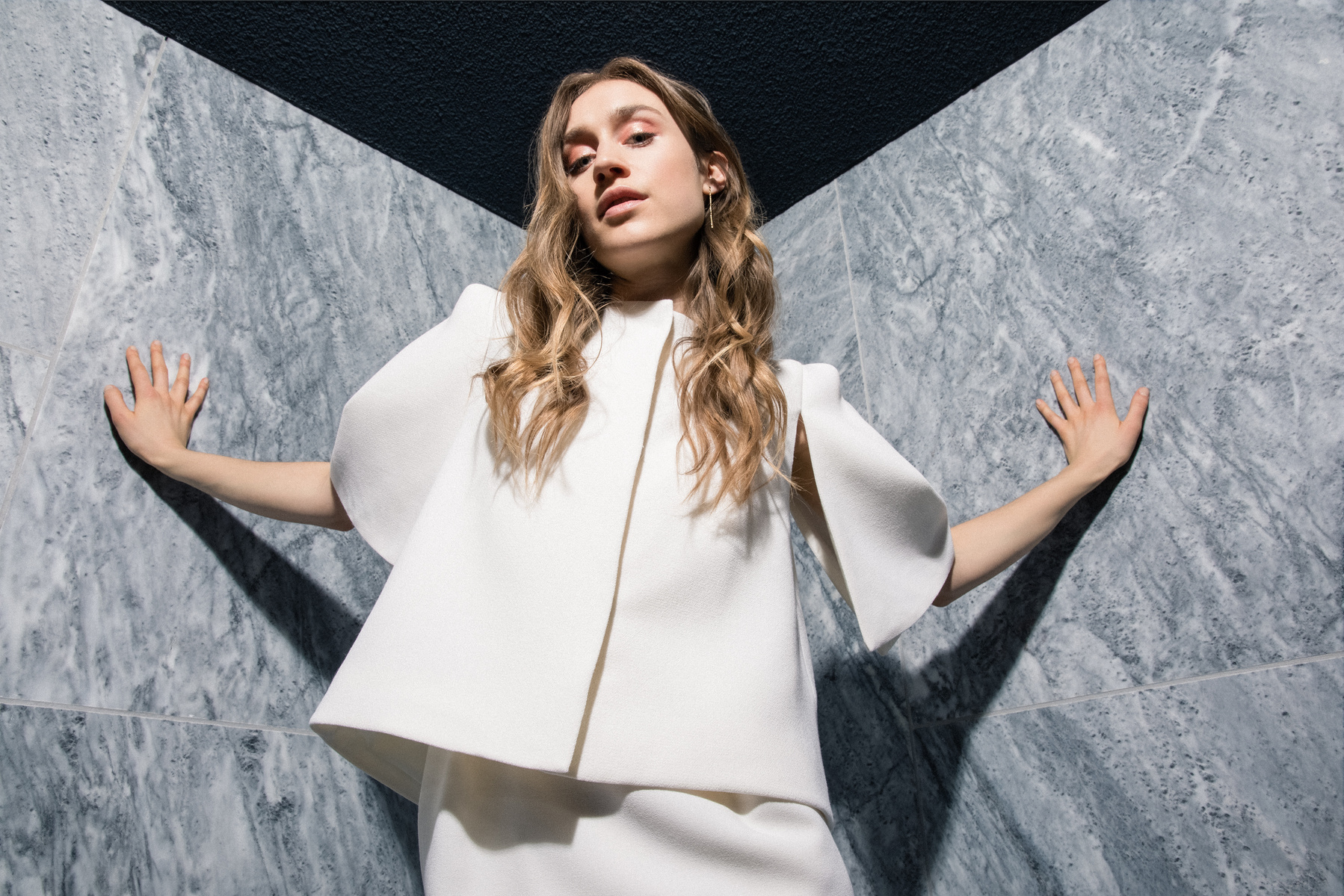 Maria Fekih´s 2018 bridal collection is inspired by past decades to add a couture elegance from the 40s and the playfulness of the 70s to the collection using fine French laces with bees and gold dots. Shot at Hotel Nobis CPH