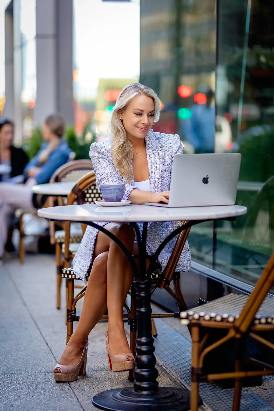 portrait of a woman looking at her laptop