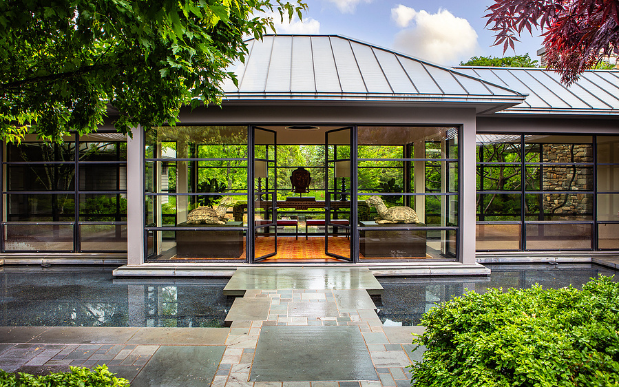 outside of a house with glass doors