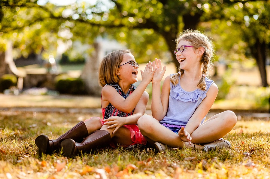 Two girls playing in the park