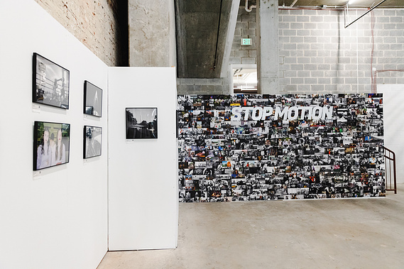 Curator Katie Dance installed a Stop Motion photography collage mural at UMBRELLA art fair presented by No Kings Collective.