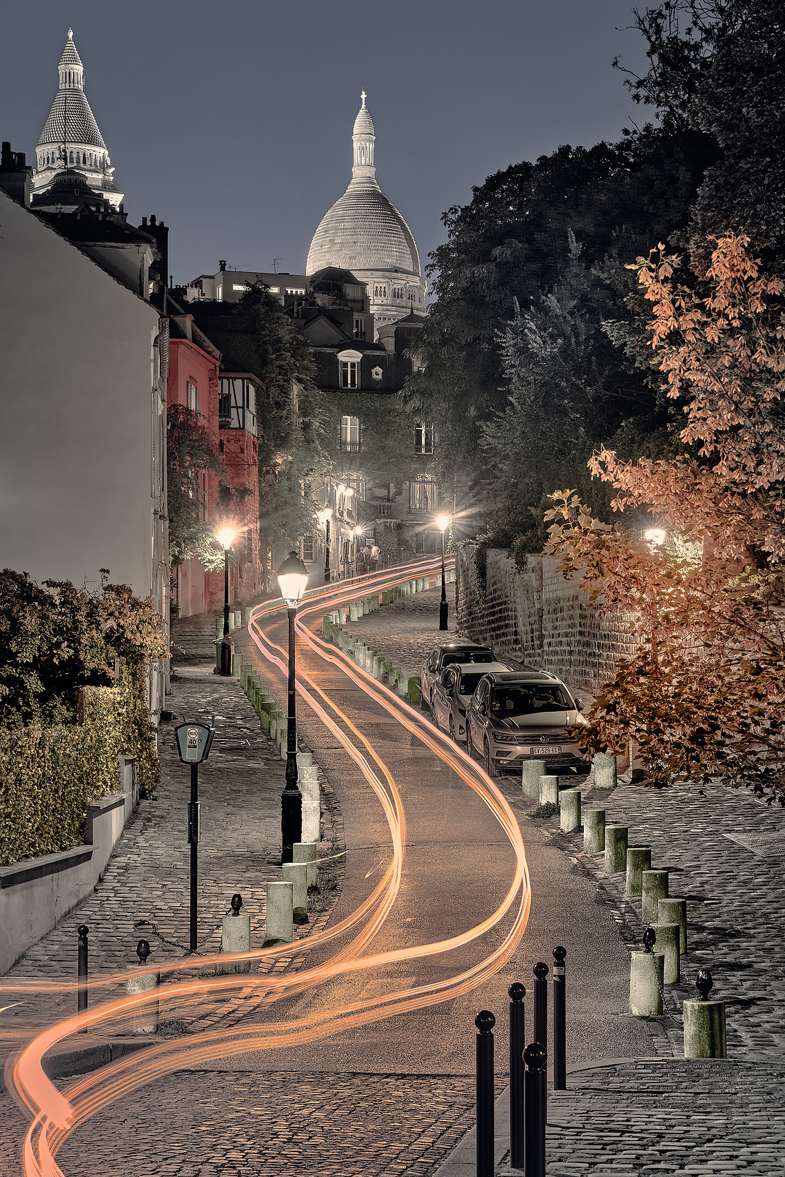 Sacre Coeur in the background in Montmartre, Paris. Nighscape. Long exposure