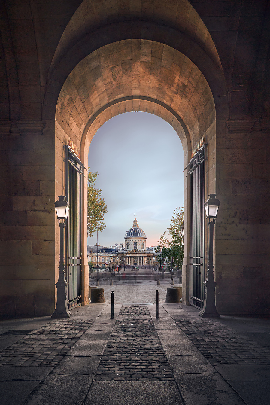 Looking through a gate at the Louvre across the Seine to the Invalides in Paris