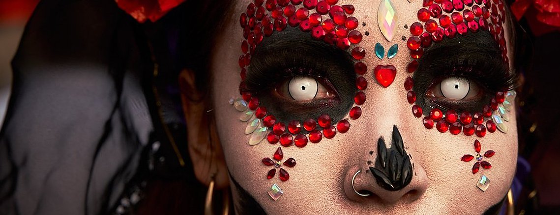 Face painting at Dia de los muertos in Mexico City, Mexico