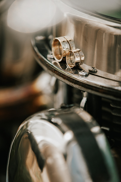 Country Wedding Morning in Courtenay, Vancouver Island. Wedding rings on Harley Davidson Chopper