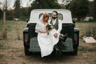 Bride and Groom in Vintage Truck. Country Wedding in Dove Creek, Courtenay, Vancouver Island