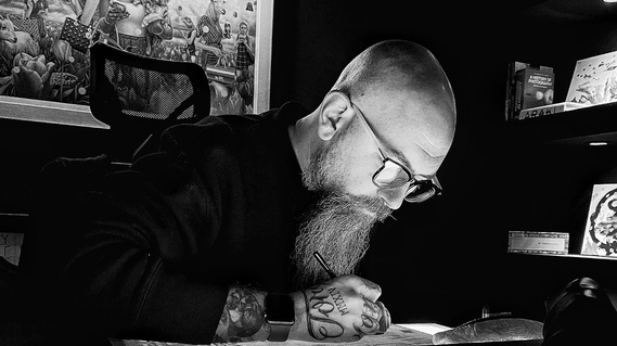 A photo of K.O. creating a set design for a shoot