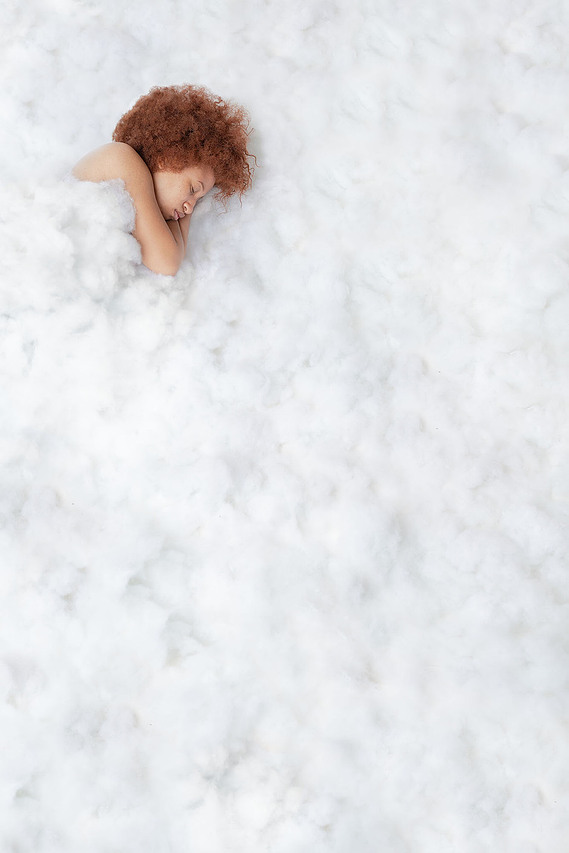 Woman in a blanket of clouds