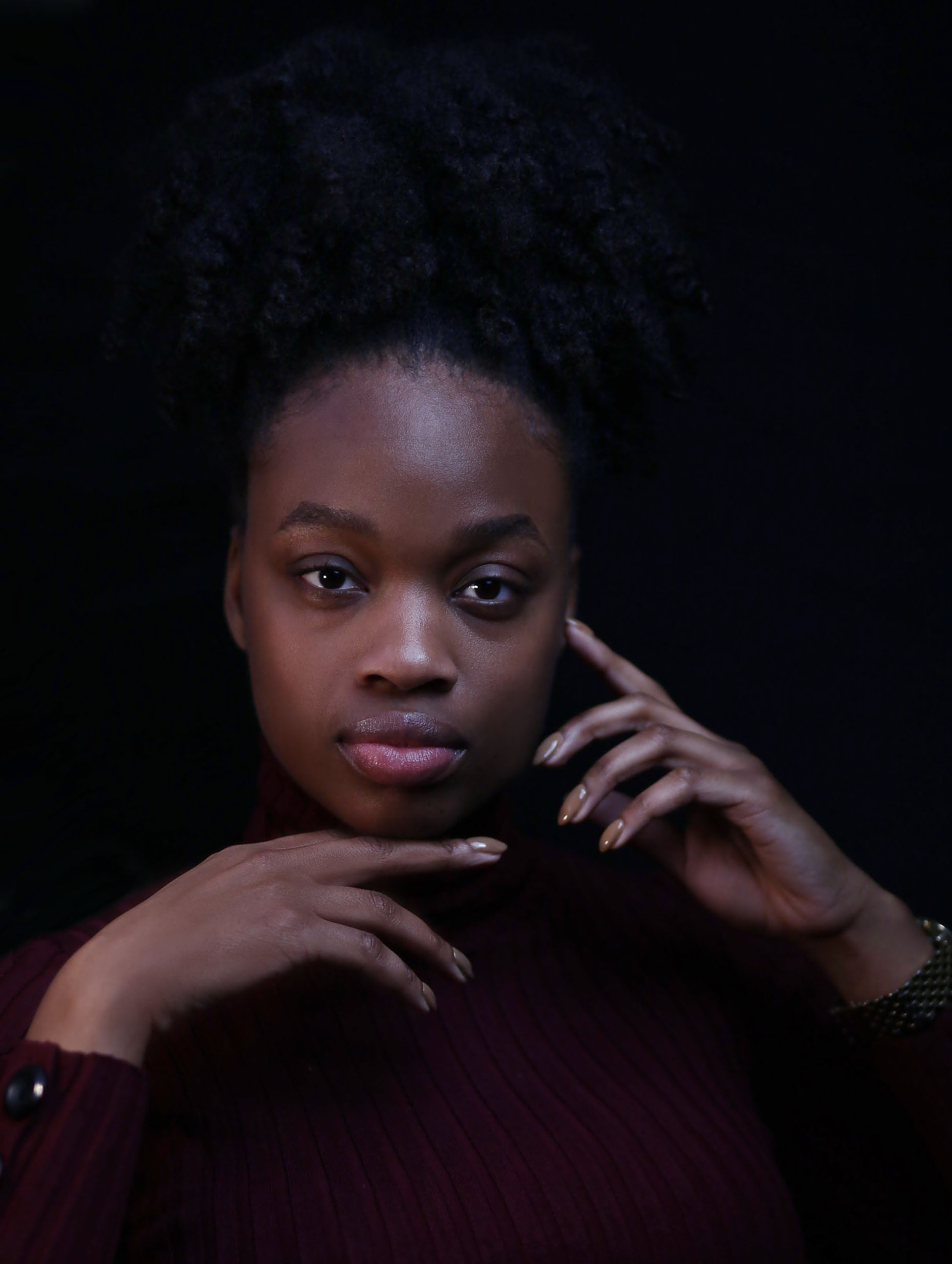 black woman in a pensive mood
