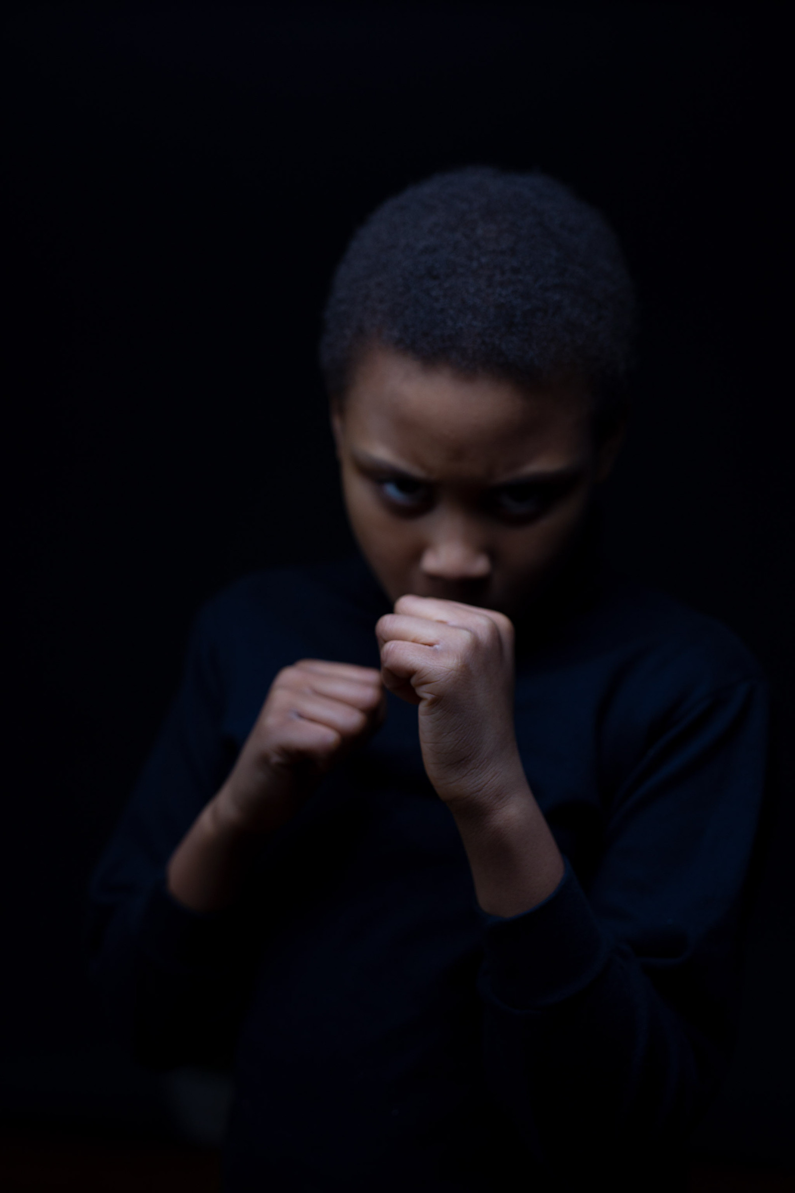 Boy with fighting fists