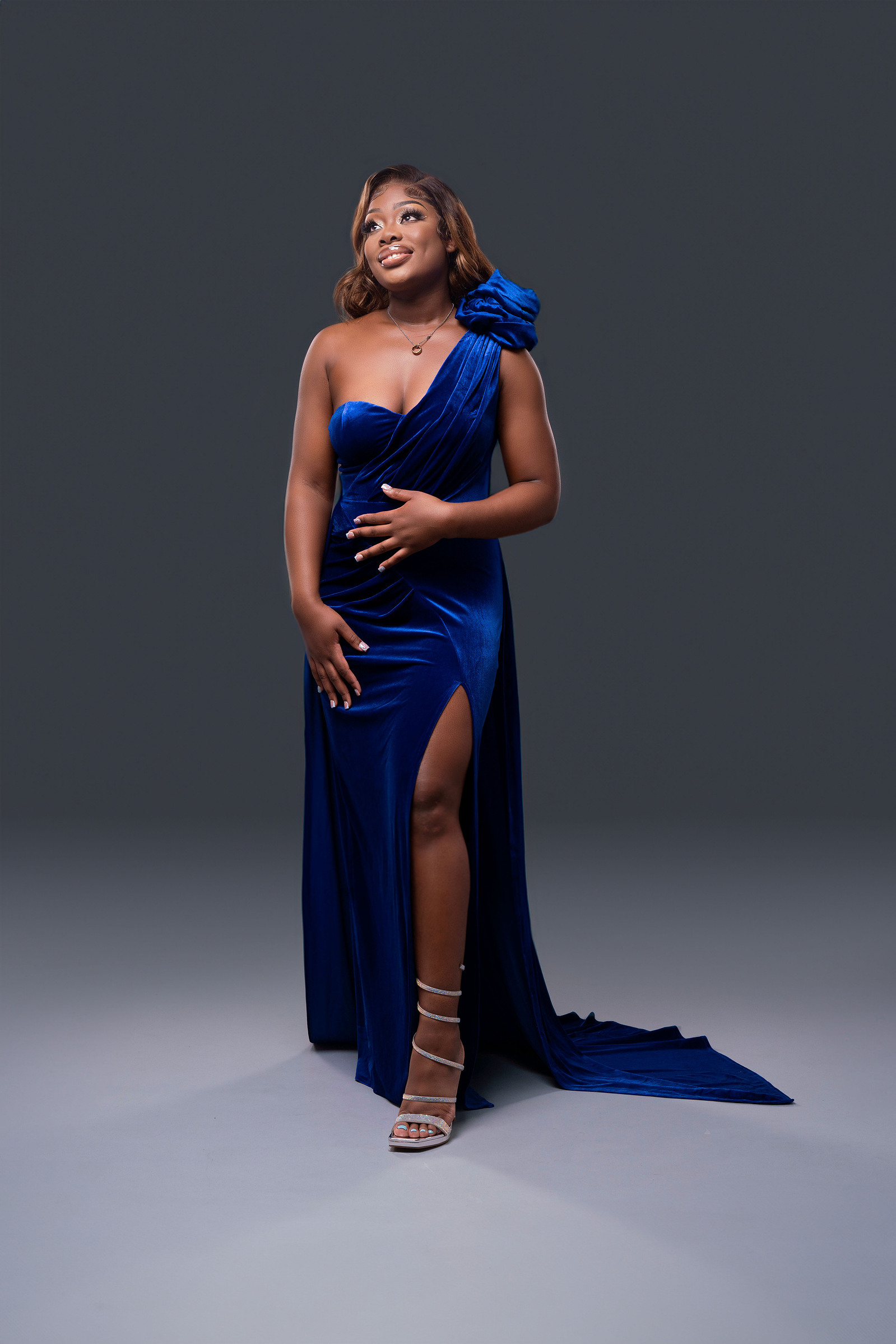woman in blue velvet gown