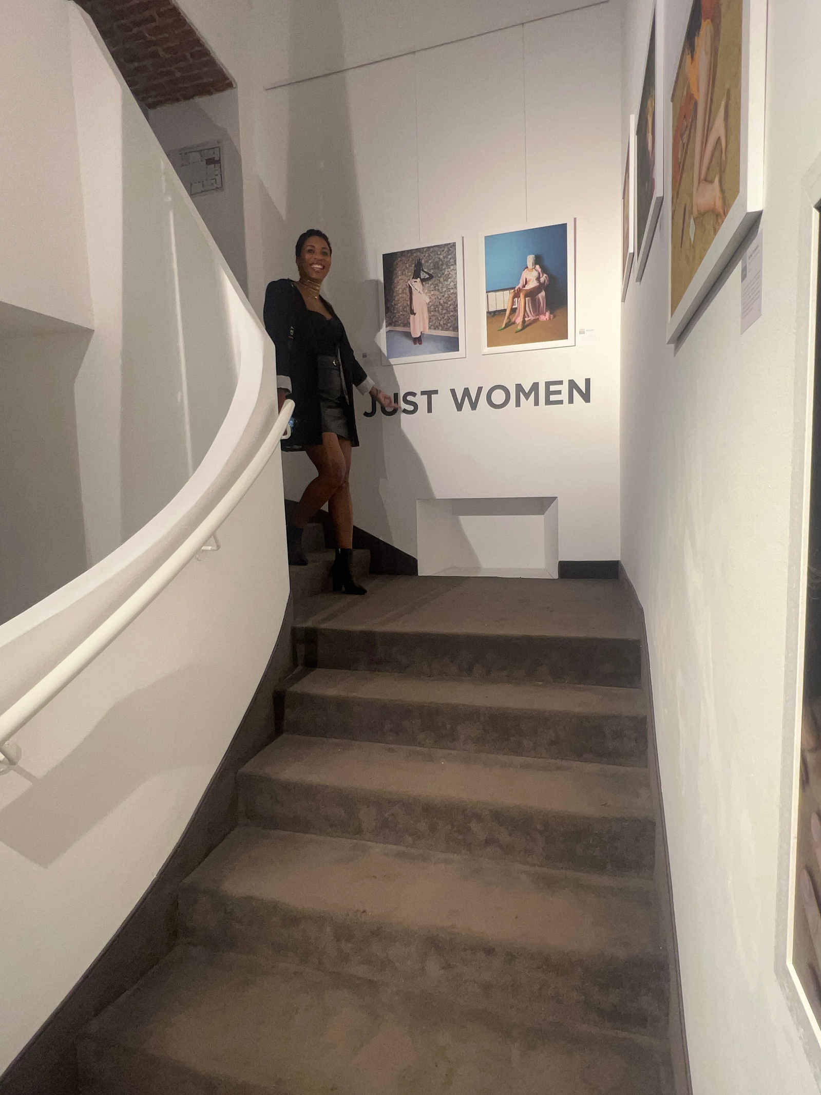 Woman pictured climbing the stairs of an Art gallery in Milan, Italy