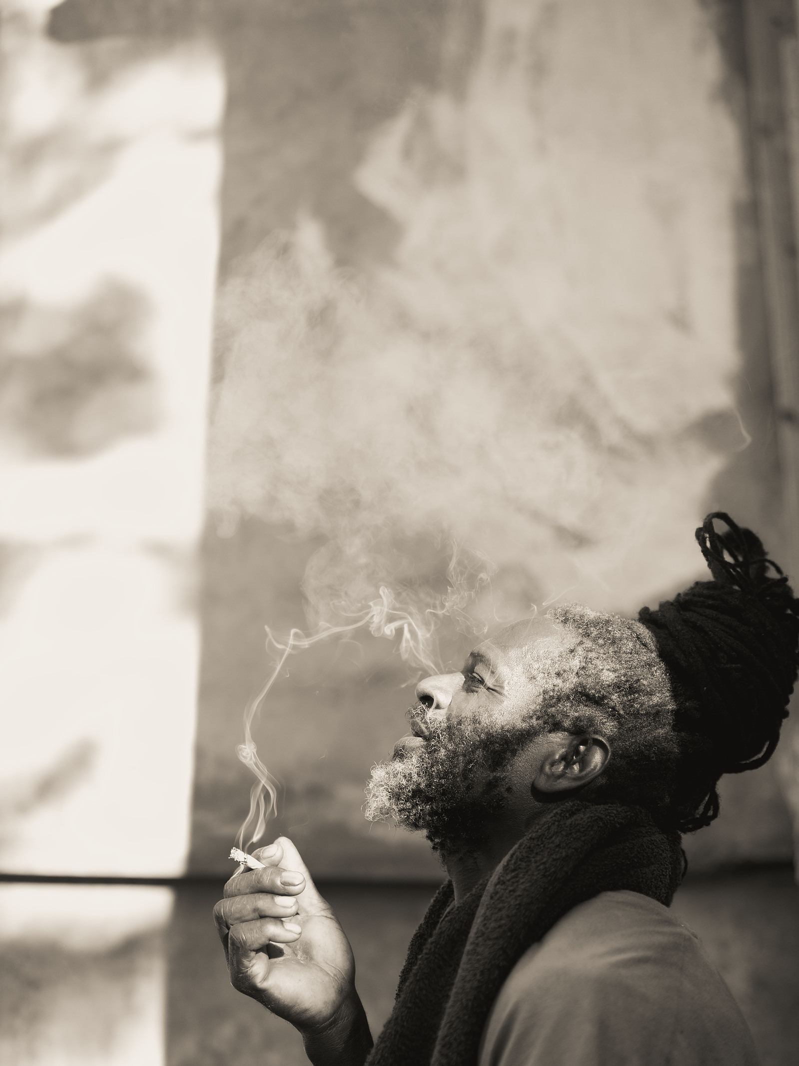 Rastafarian man smoking black history month