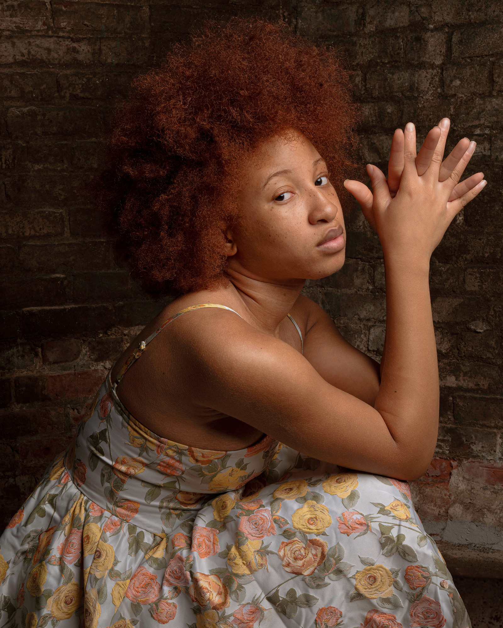 black ginger young woman with red afro hair