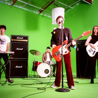 Ade Music video Ambivert. Behind the scenes from Oliver Levine animation. Band playing green screen