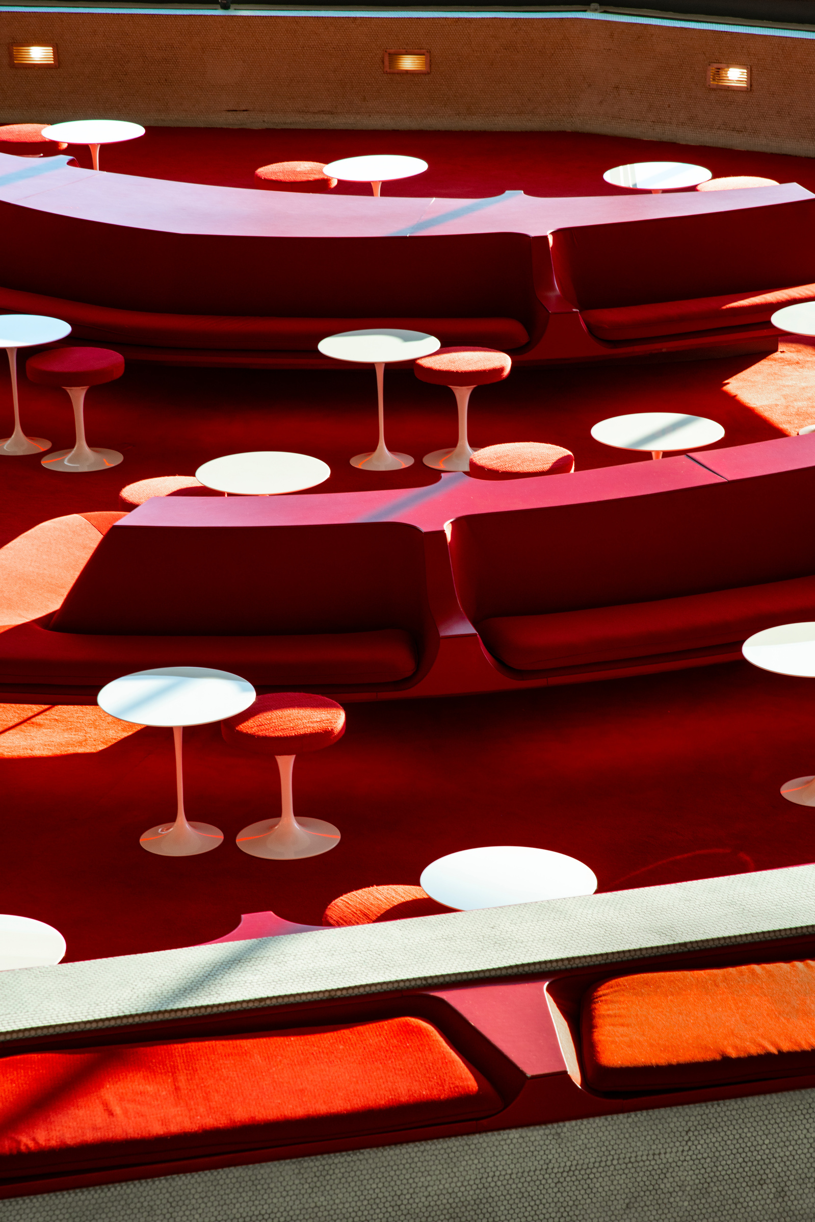Waiting area with Saarinen Chairs at the TWA Terminal Hotel, New York City at JFK Airport. Eero Saarinen architect, mid century modern architecture