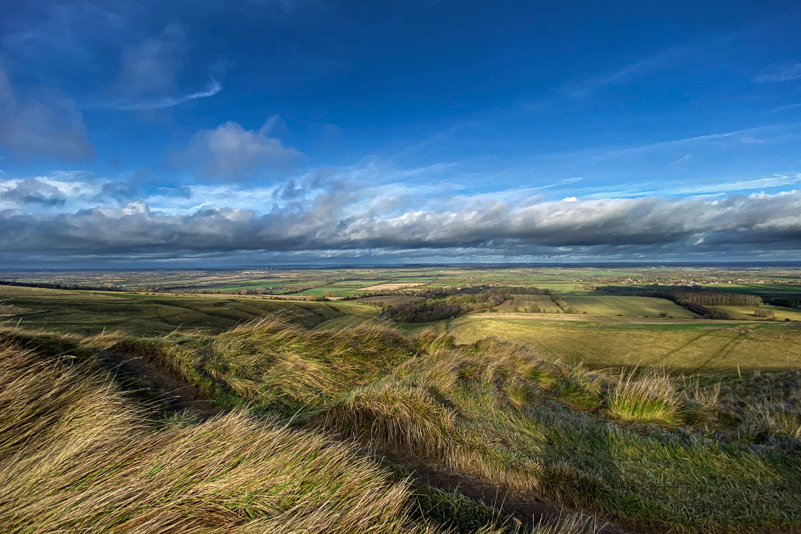 The view from the Uffington White Horse looking at Dragon Hill.