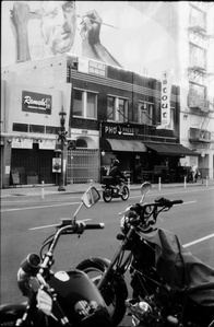 Looking at someone riding their motorcycle in downtown san diego.