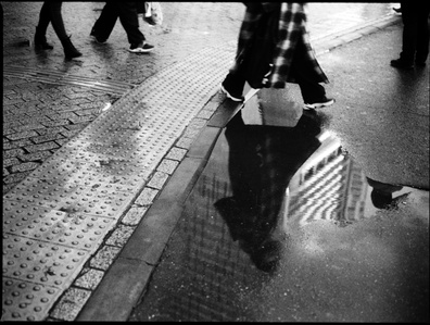 An award-winning black and white photo taken on a Mamiya 645j in Shibuya Japan.