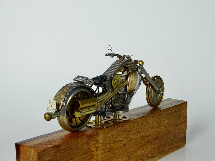 The Swag motorcycle is made using vintage clock and watch parts by Julio Milanes from Time Rider Designs.
