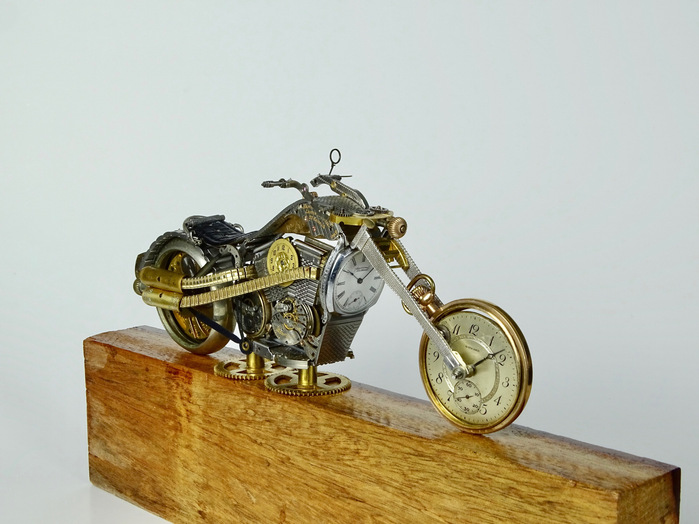 The Swag motorcycle is made using vintage clock and watch parts by Julio Milanes from Time Rider Designs.