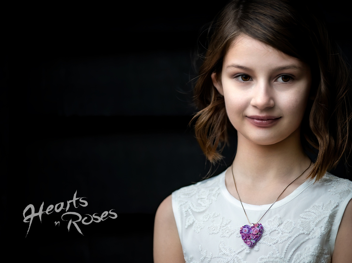 Portrait of Jacqueline wearing a Hearts and Roses necklace, jewelry shot by Nigel Sloley Photography.