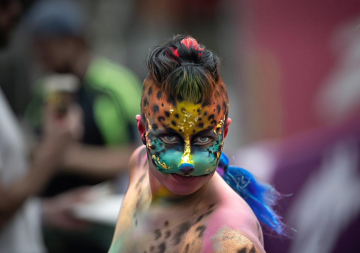 Painted Creatures in Cuba Street in Wellington New Zealand during the 2024 Cuba Street carnival. shot by Nigel Sloley Photography. Canon 1DX mkii 200mm f1.8