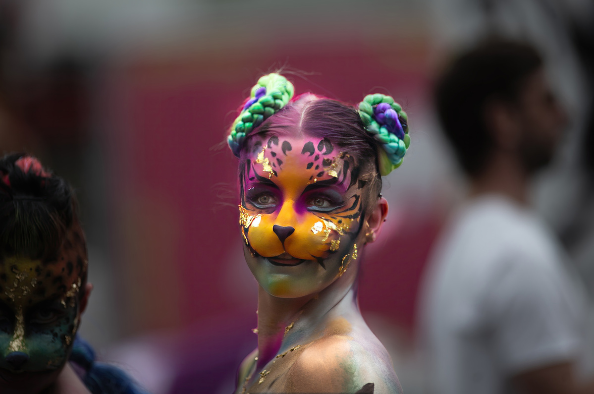 Painted Creatures in Cuba Street in Wellington New Zealand during the 2024 Cuba Street carnival. shot by Nigel Sloley Photography. Canon 1DX mkii 200mm f1.8