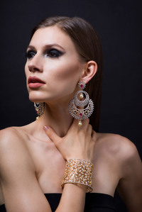 leading female model posing with contemporary jewellery by best indian jewellery designing brand yoube jewellery shoot with top indian jewellery photographer based in mumbai india