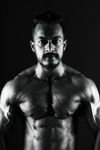 bodybuilder black and white shoot by best portrait photographer based in pune india