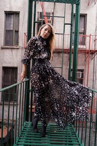 Russian model  and stylist wearing designer clothing on a colorful fire escape based in New York shot by award winning creative fashion and advertising photographer from Mumbai Santacruz Mumbai