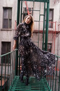 Russian model  and stylist wearing designer clothing on a colorful fire escape based in New York shot by award winning creative fashion and advertising photographer from Mumbai Santacruz Mumbai