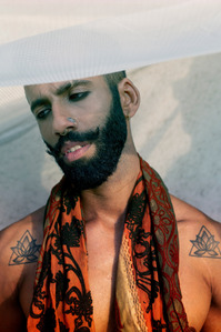 man staring in cloth shadow styled by ankita Bawiskar shoot by best Indian portrait photographer based in mumbai india