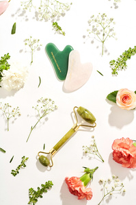 creative table top down photography shot of gua sha and face roller cosmetic luxury product photography in studio shoot setup for brand campaign by creative product photographer ashish gurbani based in pune india