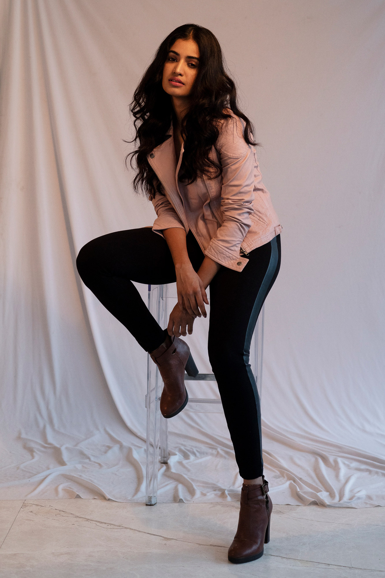 beautiful model susruti krishna sitting on chair studio photoshoot posing with the best indian fashion photographer based in bandra mumbai india
