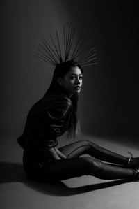 side pose sitting dark lighting experimental by best advertising photographer in mumbai pune india delhi